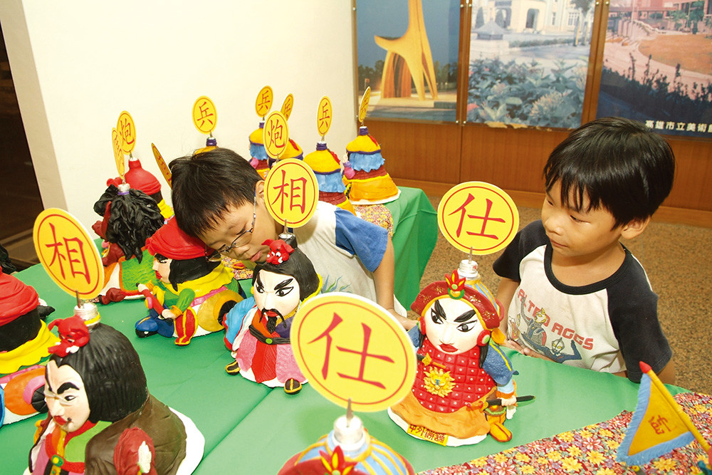  "Cake Chess Playing" is a chess games with a difference; how it differs from an ordinary game of chess is that the chess pieces are cakes. Once you take the other player's cake, you can eat it. 