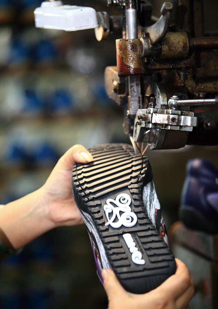 The factory tour includes observing production, a foot checkup and foot scans.