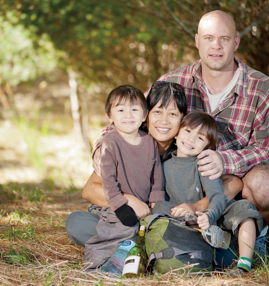 Rich (in the back) and his family, Vilian (left), Alas(center) and Vaji (right).