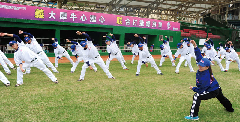Players warm up at the start of a training session.