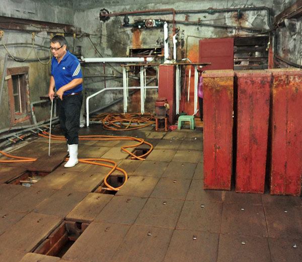 The factory\'s manually-controlled gigantic refrigerator