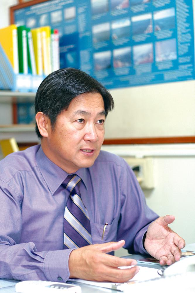 胡延章講述成為引水人的歷程·臉上充滿專業的自信。