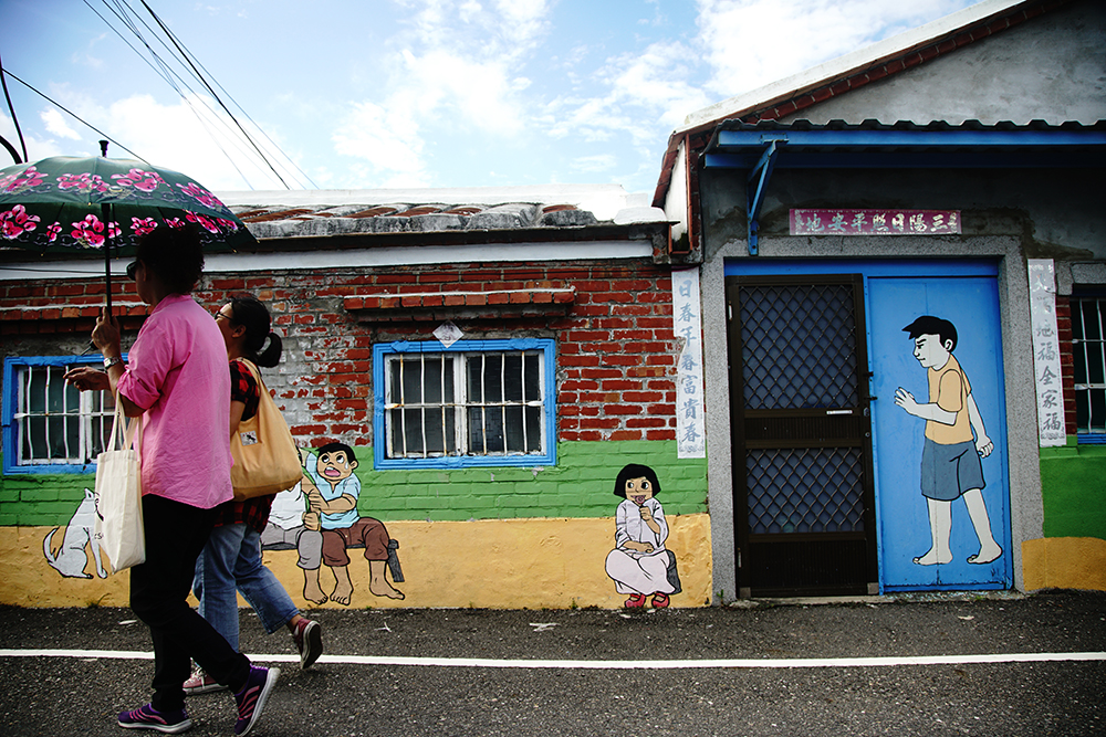 祖厝壁畫是鹽田社區居民的生活日常。