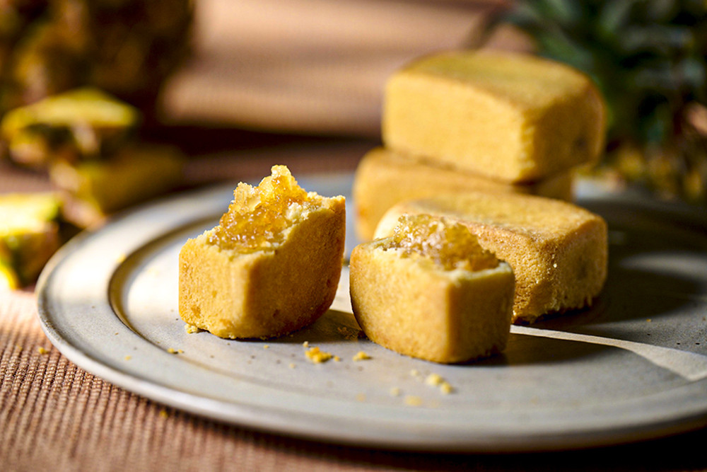 BLACKPINK演唱會Rosé吃鳳梨酥感到驚喜的畫面，讓舊振南金字招牌鳳梨酥再度躍上國際舞台。(圖片提供/舊振南)