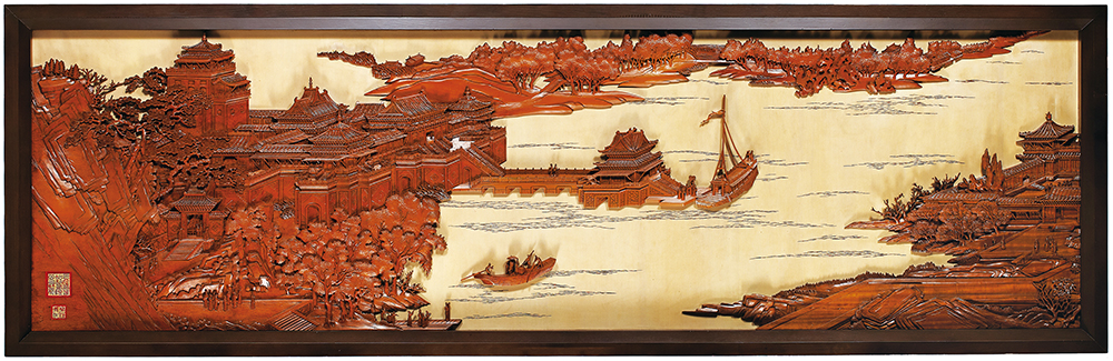「傳統木雕」工藝代表葉經義的作品《清明上河圖》以浮雕成具立體空間深邃視野的景觀，呈現虛實相間、動靜輝映的完整作品。（照片提供/文化部文化資產局）
