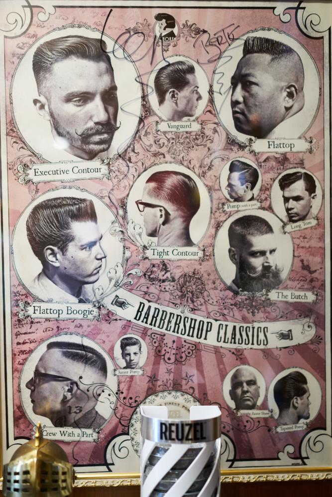珍藏大師簽名的海報，各種髮型都有擁護者。